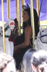 KIM KARDASHIAN at Disneyland for North West