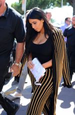 KIM KARDASHIAN Leaves Armani Caffe in Cannes 06/24/2015