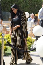 KIM KARDASHIAN Leaves Armani Caffe in Cannes 06/24/2015