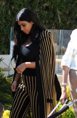 KIM KARDASHIAN Leaves Armani Caffe in Cannes 06/24/2015