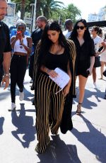 KIM KARDASHIAN Leaves Armani Caffe in Cannes 06/24/2015