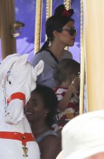 KOURTNEY KARDASHIAN at Disneyland for North West