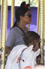 KOURTNEY KARDASHIAN at Disneyland for North West