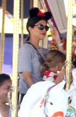 KOURTNEY KARDASHIAN at Disneyland for North West