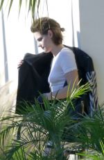 KRISTEN SYEWART on the Set of a Photoshoot in Los Angeles 06/24/2015