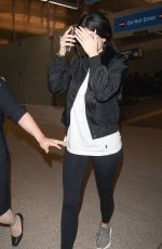 KYLIE JENNER Arrives at LAX Airport in Los Angeles 06/27/2015