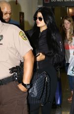 KYLIE JENNER Arrives at Miami International Airport 06/19/2015