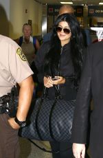 KYLIE JENNER Arrives at Miami International Airport 06/19/2015
