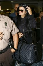 KYLIE JENNER Arrives at Miami International Airport 06/19/2015