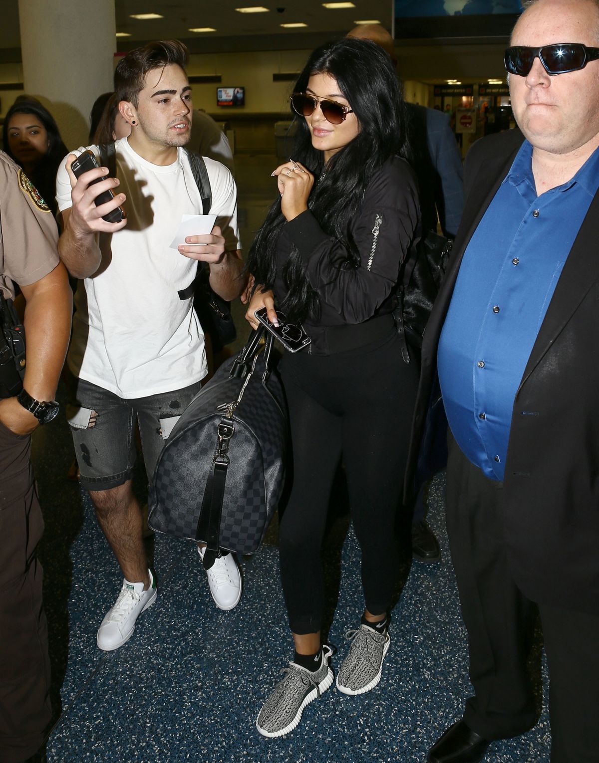 KYLIE JENNER Arrives at Miami International Airport 06/19/2015 – HawtCelebs