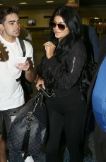 KYLIE JENNER Arrives at Miami International Airport 06/19/2015