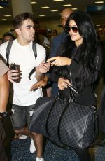 KYLIE JENNER Arrives at Miami International Airport 06/19/2015