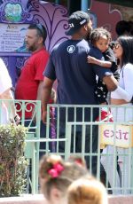 KYLIE JENNER at Disneyland for North West