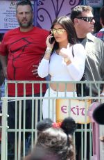 KYLIE JENNER at Disneyland for North West