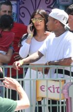 KYLIE JENNER at Disneyland for North West