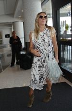 LEANN RIMES at Los Angeles International Airport 006/11/2015