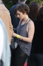 LILY COLLINS Arrives at U2 Concert in Inglewood