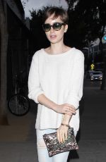 LILY COLLINS Out in Santa Monica Boulevard in Los Angeles 06/10/2015