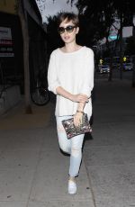 LILY COLLINS Out in Santa Monica Boulevard in Los Angeles 06/10/2015