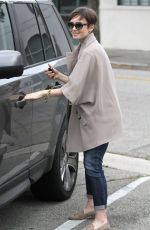 LILY COLLINS Out Shopping in Beverly Hills 06/09/2015