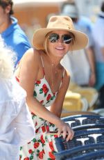 LINDSAY LOHAN Arrives at a Boat in Naples 06/27/2015