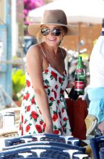 LINDSAY LOHAN Arrives at a Boat in Naples 06/27/2015