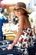 LINDSAY LOHAN Arrives at a Boat in Naples 06/27/2015