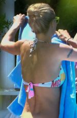 MICHELLE HUNZIKER in Bikini at a Pool in Forte Dei Marmi in Italy 06/21/2015