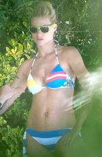 MICHELLE HUNZIKER in Bikini at a Pool in Forte Dei Marmi in Italy 06/21/2015