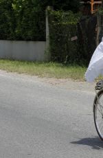 MICHELLE HUNZIKER Riding a Bike in Forte Dei Marmi 06/13/2015