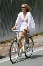 MICHELLE HUNZIKER Riding a Bike in Forte Dei Marmi 06/13/2015