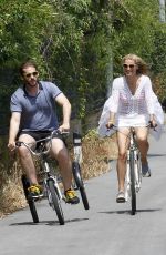 MICHELLE HUNZIKER Riding a Bike in Forte Dei Marmi 06/13/2015