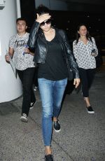 MILA KUNIS at Los Angeles International Airport 06/25/2015