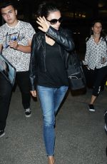MILA KUNIS at Los Angeles International Airport 06/25/2015
