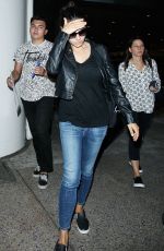 MILA KUNIS at Los Angeles International Airport 06/25/2015