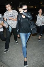 MILA KUNIS at Los Angeles International Airport 06/25/2015