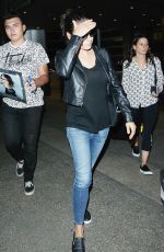 MILA KUNIS at Los Angeles International Airport 06/25/2015