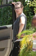 MILLA JOVOVICH in Leggings Out in West Hollywood 06/24/2015