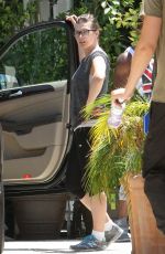 MILLA JOVOVICH in Leggings Out in West Hollywood 06/24/2015