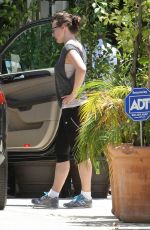 MILLA JOVOVICH in Leggings Out in West Hollywood 06/24/2015