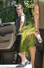 MILLA JOVOVICH in Leggings Out in West Hollywood 06/24/2015