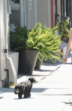 MIRANDA COSGROVE Walks Her Dog Out in Los Angeles 06/20/2015