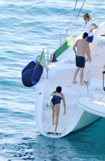NIKKI REED in Swimsuit at a Boat in Italy 06/25/2015