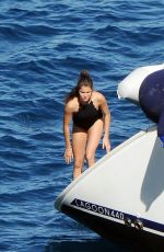 NIKKI REED in Swimsuit at a Boat in Italy 06/25/2015