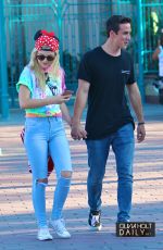 OLIVIA HOLT and Ray Kearin Out and About in Disneyland