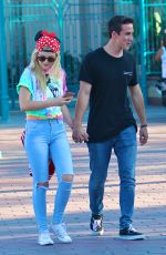 OLIVIA HOLT and Ray Kearin Out and About in Disneyland