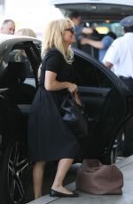 PAMELA ANDERSON at LAX Airport in Los Angeles 06/16/2015