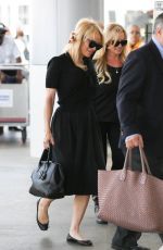 PAMELA ANDERSON at LAX Airport in Los Angeles 06/16/2015