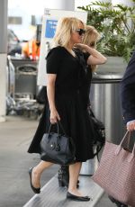 PAMELA ANDERSON at LAX Airport in Los Angeles 06/16/2015