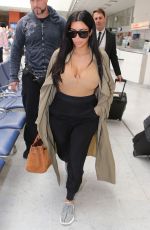 Pregnant KIM KARDASHIAN Arrives at Airport in Nice 06/23/2015